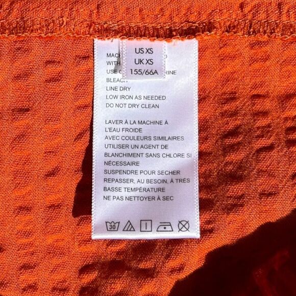 NEW Urban Outfitters XS Mini Skirt Wrap Women Textured Orange Pleated Casual - Picture 8 of 9